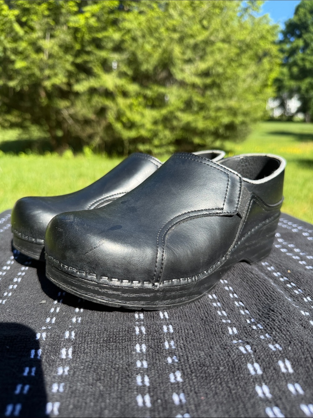 WMNs Previously loved Black Leather Dansko Slip-On Clogs